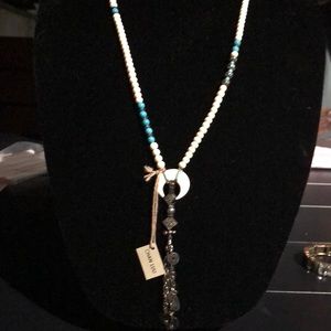 Turquoise , silver and ivory bead necklace